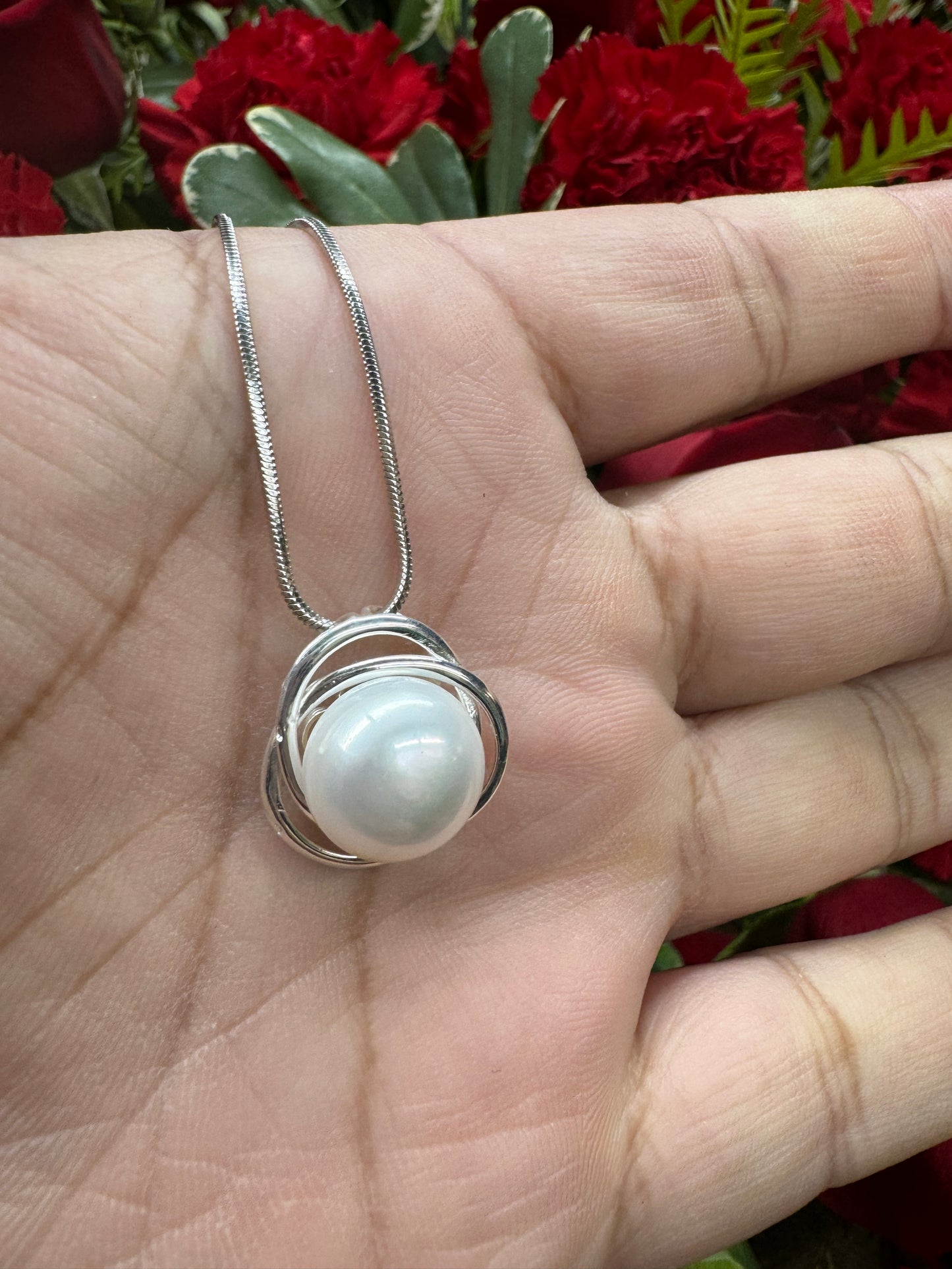 Freshwater Pearl set in Silver with a Triple Venn Design